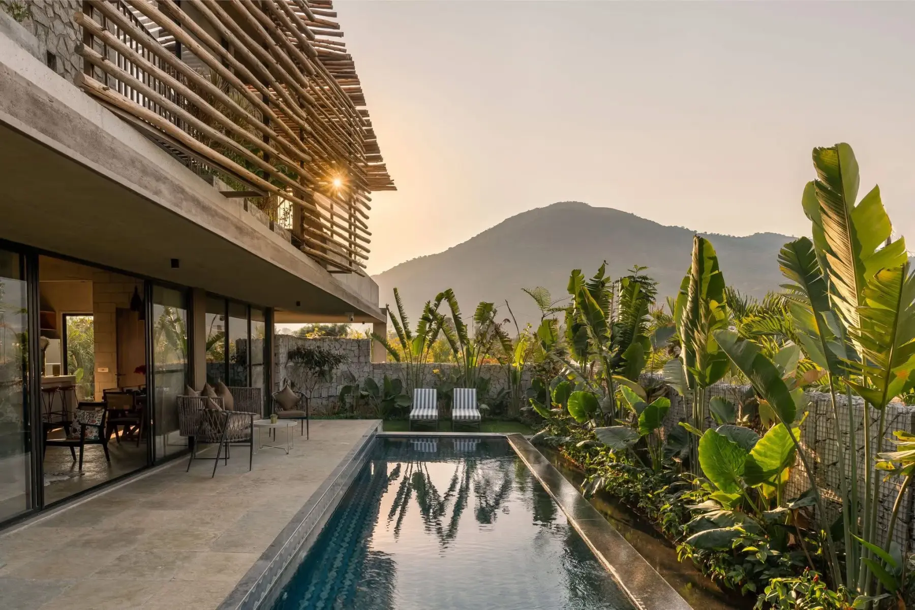 A Homes of Sanctuary villa with the hills behind it