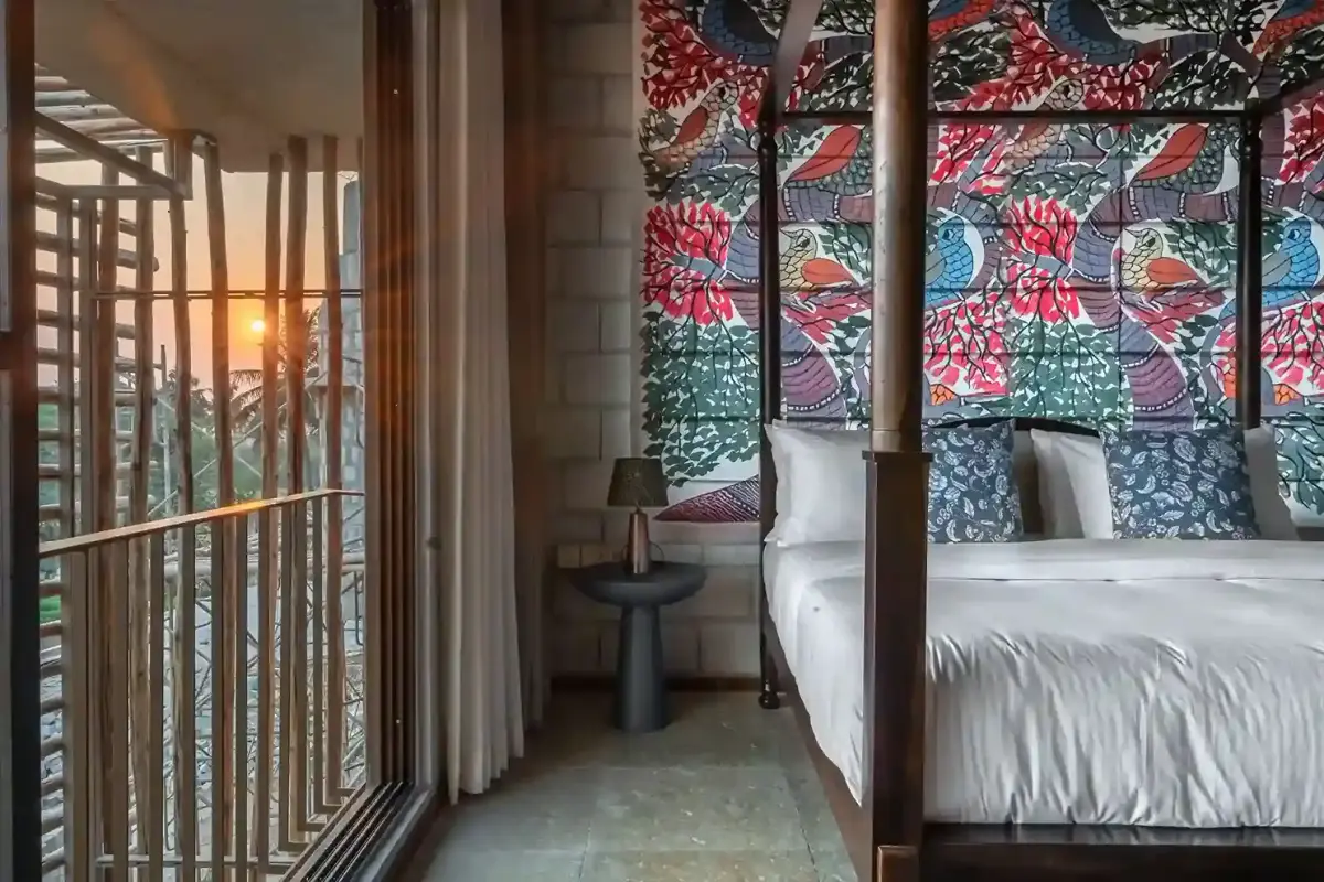 Bedroom at Villa Maaya with patterned textile screens