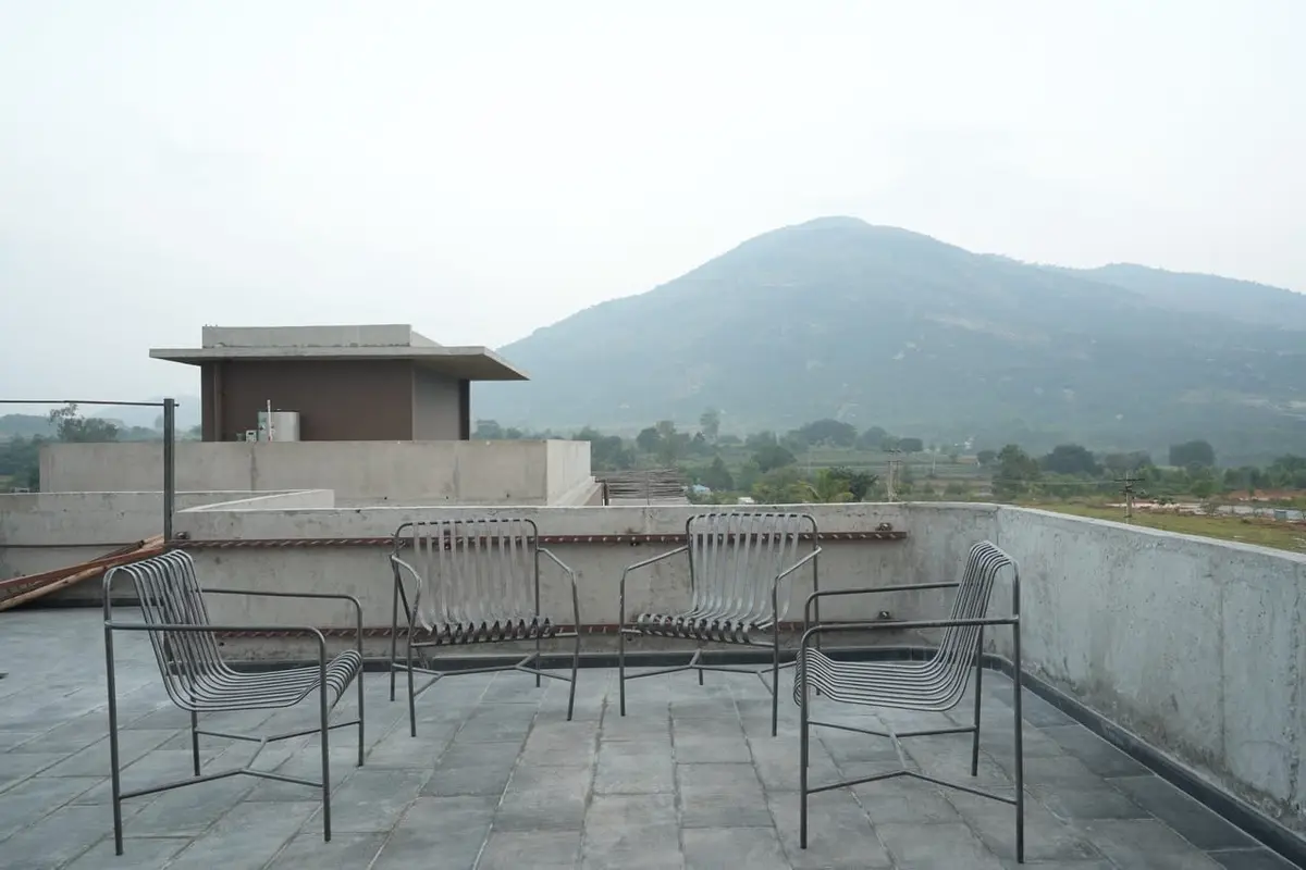 Terrace seating at Villa Praana with the hills in the distance